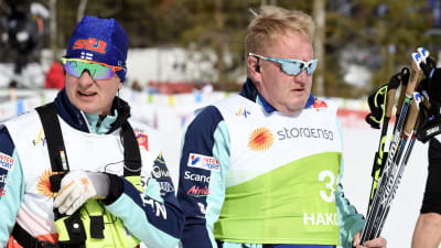 Skidlandslandslagets chefstränare Matti Haavisto och Olli-Pekka Kärkkäinen från olympiska kommittén. 