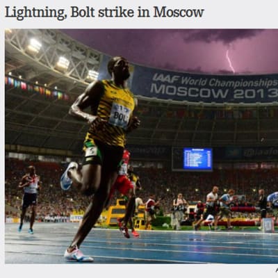 Usain Bolt med blixt i bakgrunden