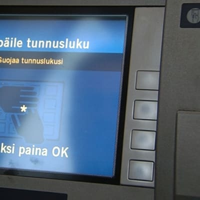 Pankkiautomaatin näyttöruutu.