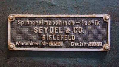 En skylt för spinnerimaskintillverkaren Seydel & co.