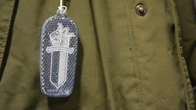 polisens vapen på reflexbricka