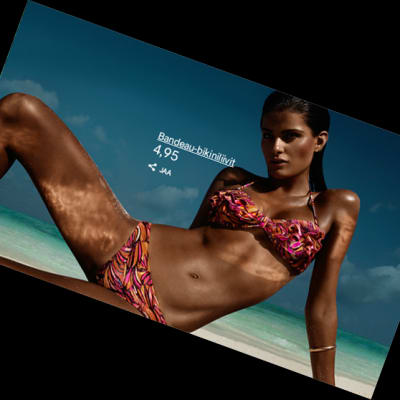 Kvinna i bikini i strandposé, saxat ur en reklam för en bikinidräkt.