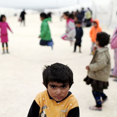 Lapset leikkivät Sanliurfassa sijaitsevalla pakolaisleirillä Turkissa 30. tammikuuta.
