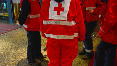 Röda korset-frivilliga vid Waskia.