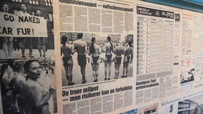 Tidningsklipp med texter på danska och grönländska.