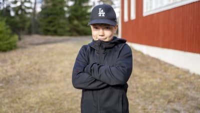 En ung pojke med keps, Axel Högström.