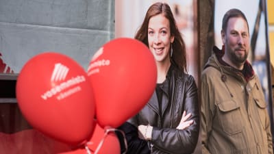 Li Andersson och Paavo Arhinmäki med röda kampanjballonger.