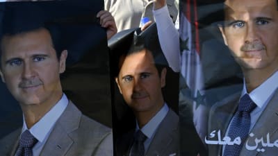 Syriens president Bashar al-Assad på valaffischer inför valet i maj, då han återvaldes.