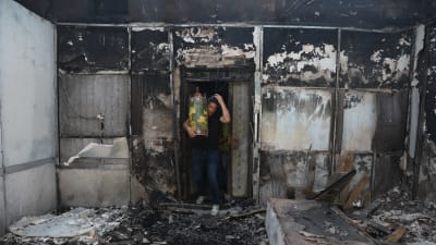 Bild på en bränd synagoga i Israel.