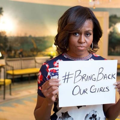 Michelle Obama tweeted a photo that shows the First Lady holding a sign that says, "#BringBackOurGirls," in reference to the missing Nigerian schoolgirls, on May 7, 2014.