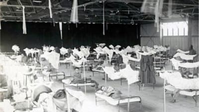 Patienter i ett tillfälligt sjukhus i USA under spanska sjukan 1918