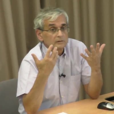 A man explaining with hands