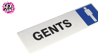 en skylt med "Gents" text