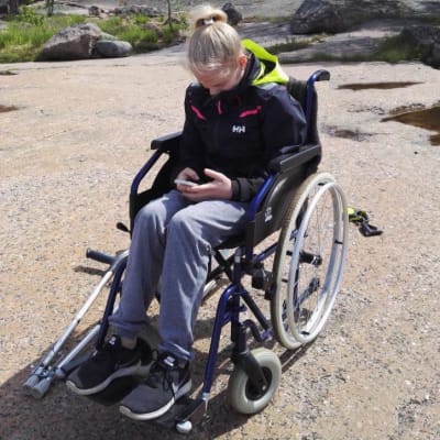 Redskapsgymnasten Enni Kettunen i rullstol.