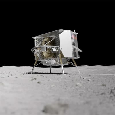 Pieneltä metalliselta talolta näyttävä laskeutuja seisoo neljällä jalalla Kuun tomuisella pinnalla. 