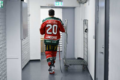 Joel Lundqvist walks in a corridor. 