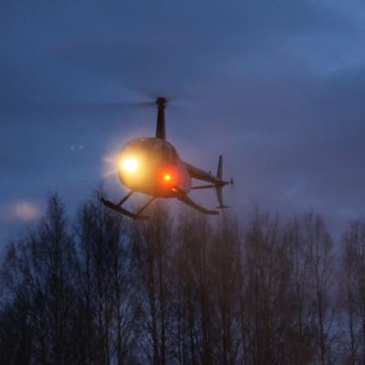 Helikopteri iltahämärässä