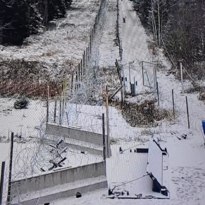 Temporary concrete and wire barriers on Finland's eastern border.