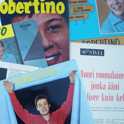 Robertino Loretin äänilevyjä ja hänestä kertovia lehtijuttuja 1960-luvulta.