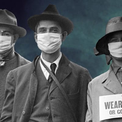 3 personer iförda munskydd under influensapandemin 1918.
