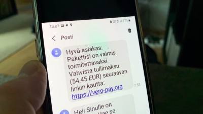 En phishing-text på en mobiltelefonskärm.