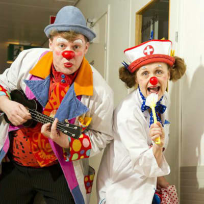 Sjukhusclownerna är oroade över den senaste tidens trend med vuxna som skrämmer barn iklädda clownmasker.