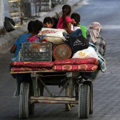 Palestinier flyr Gaza.
