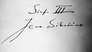 Jean Sibeliuksen nimikirjoitus ja teksti: sinfonia III.