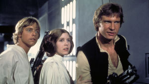 Han Solo i Harrison Fords version tillsammans med Princess Leia och Luke Skywalker. Luke Skywalker ( Mark Hamill), prinsessan Leia (Carrie Fisher) och Han Solo (Harrison Ford) i Star Wars 1977.