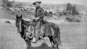 En amerikansk cowboy 1888. The Cow Boy från 1888 av John C.H. Grabill