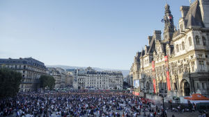   French supporters gathered in a square in Paris. 