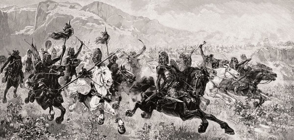 Ratsumiesjoukko hyökkäämässä. Joukkoa johtaa haarniskaan pukeutunut hunnijohtaja Attila, jolla on miekka. Muilla on aseinaan myös muun muassa kirveitä ja keihäitä. 