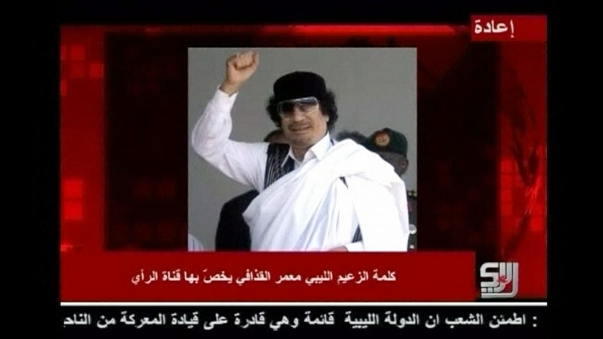 Televisiokanava al-Rain lähettämän puheen taustalla oleva still-kuva Muammar Gaddafista.