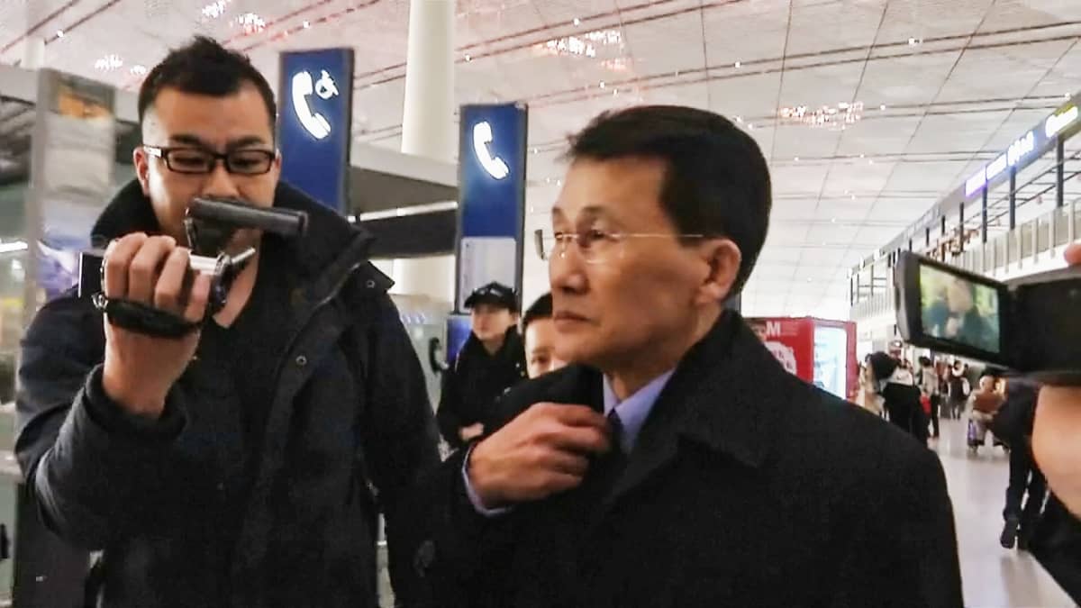 Choi Kang Il Pekingin lentokentällä 18. maaliskuuta.