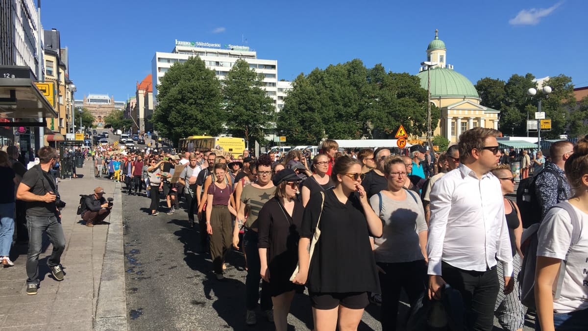 Turku without Nazis supporters chant "Turku belongs to everyone - except Nazis!"