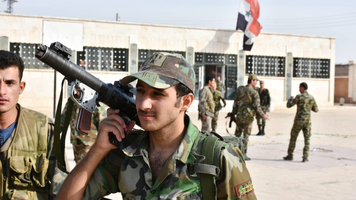 Syyrialaisia sotilaita Manbijin kaupungissa 15. lokakuuta. 
