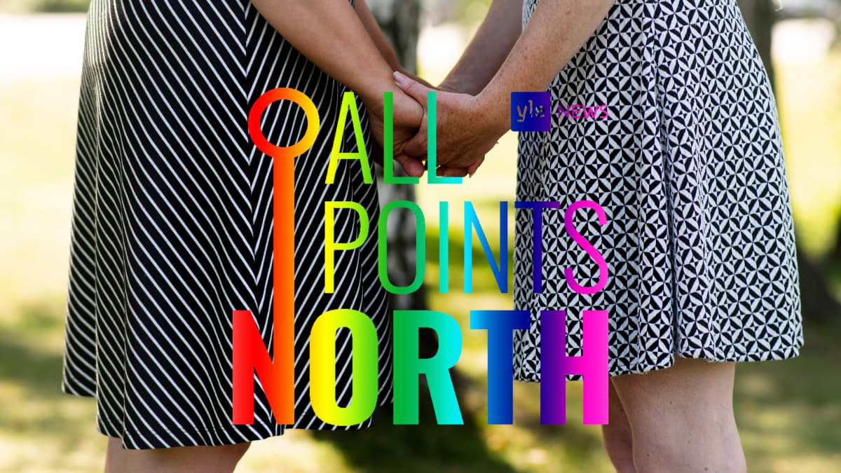 All Points North logo with photo of two women holding hands