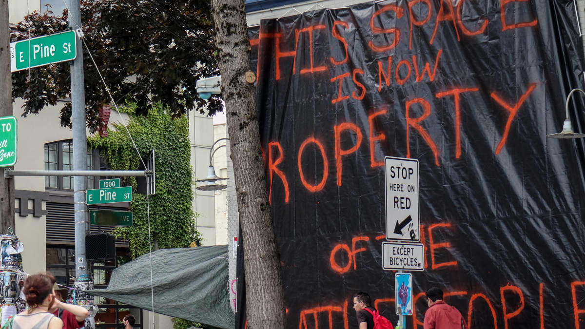 lakana jossa lukee "tämä alue kuuluu seattlelaisille"