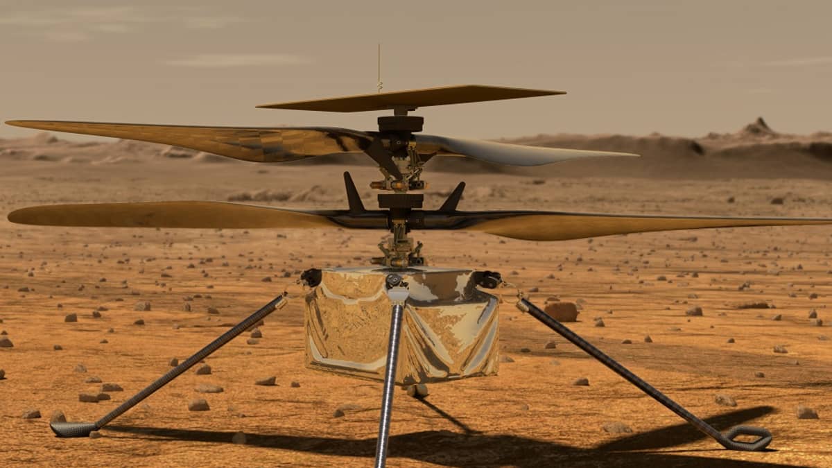 Neljällä jalalla seisova nelilapainen pieni helikopteri. 