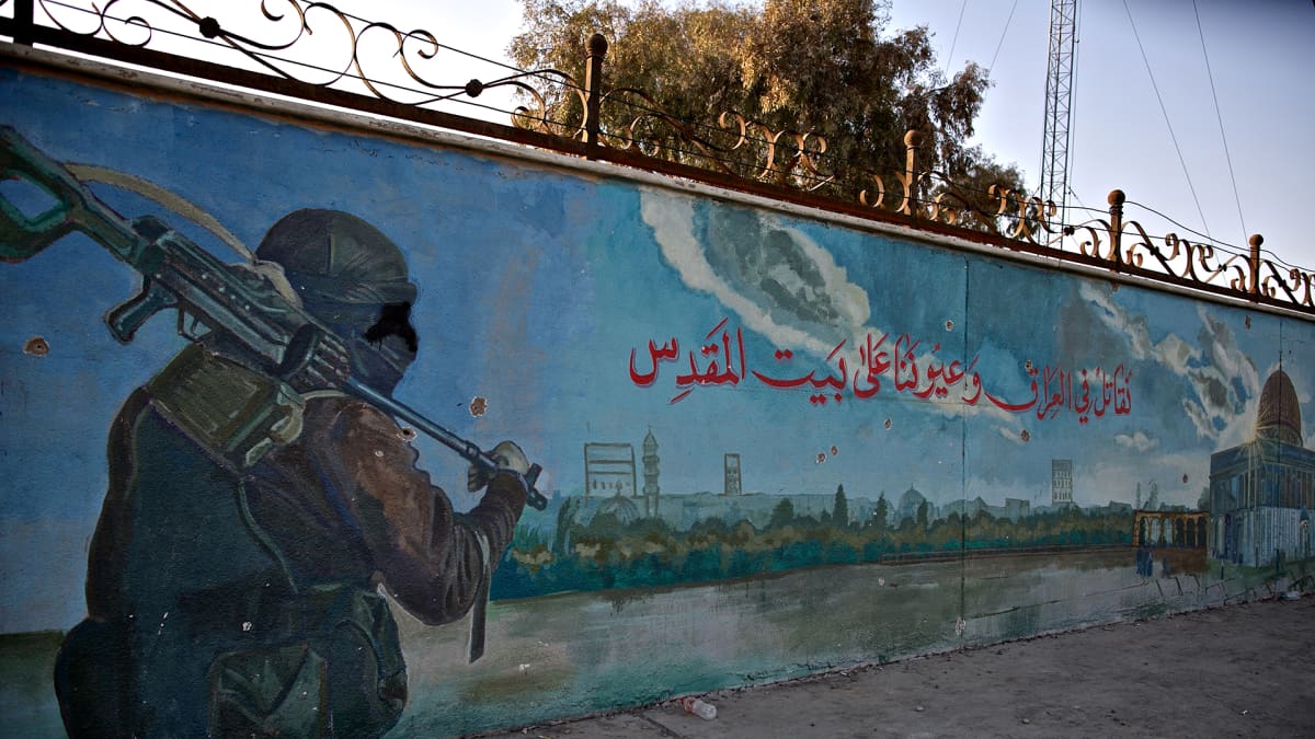 Isiksen voittokulkua kuvaava seinämaalaus Mosulin kaupungissa Irakissa.
