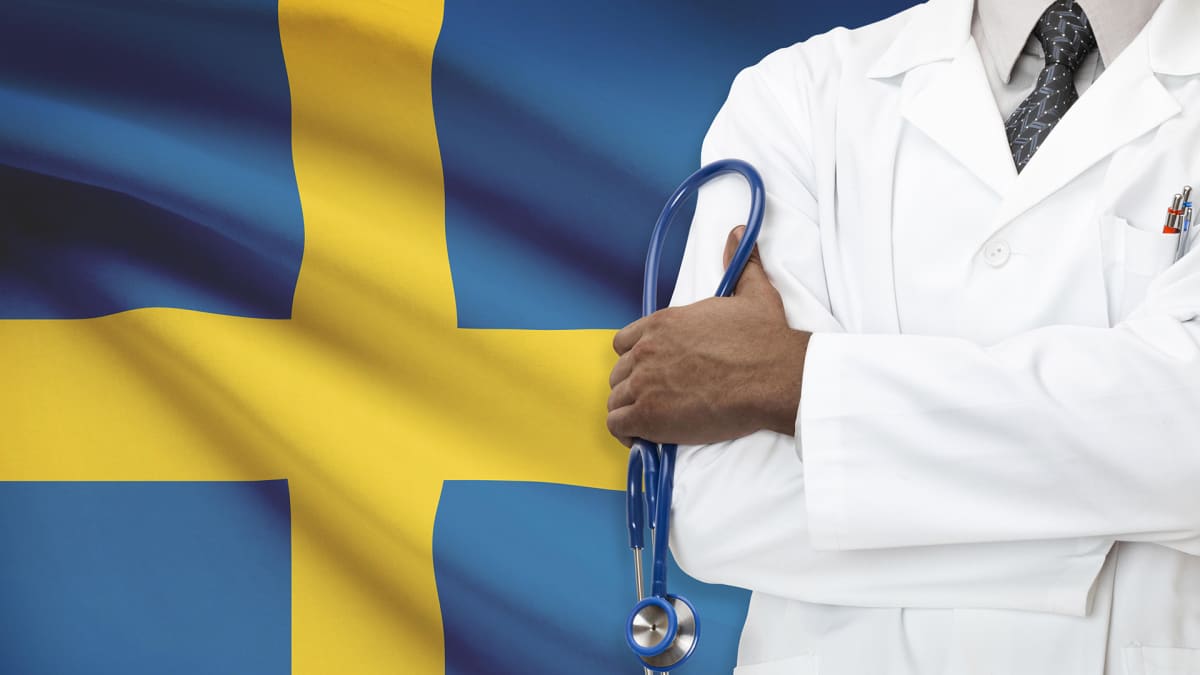 Lääkäri ja Ruotsin lippu.