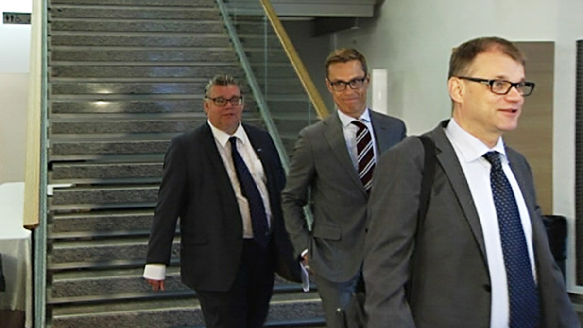Timo Soini, Alexander Stubb ja Juha Sipilä.