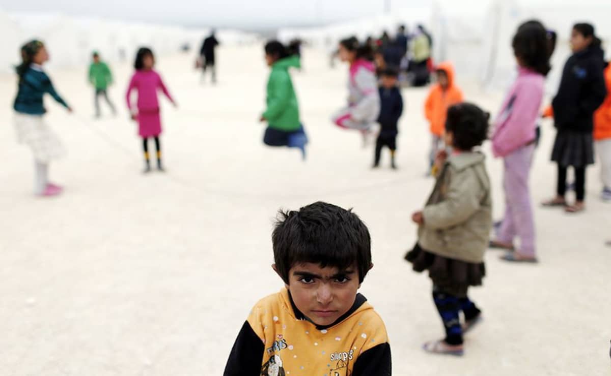 Lapset leikkivät Sanliurfassa sijaitsevalla pakolaisleirillä Turkissa 30. tammikuuta.