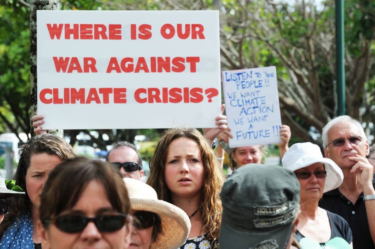 Ympäristönsuojelijoita osoittamassa mieltään Cairnsin kaupungissa ennen G20-kokousta syyskuussa 2014.