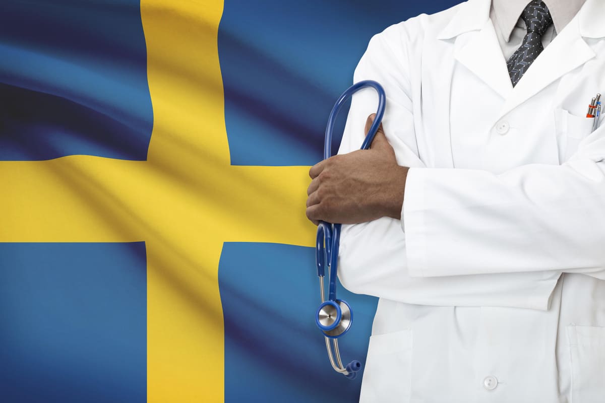Lääkäri ja Ruotsin lippu.