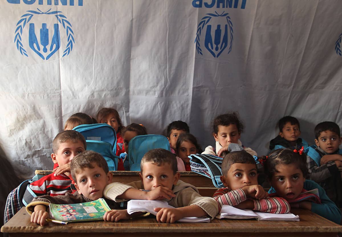 Syyrialaisia lapsia UNCHR:n järjestämässä telttakoulussa Daraassa 27. lokakuuta.