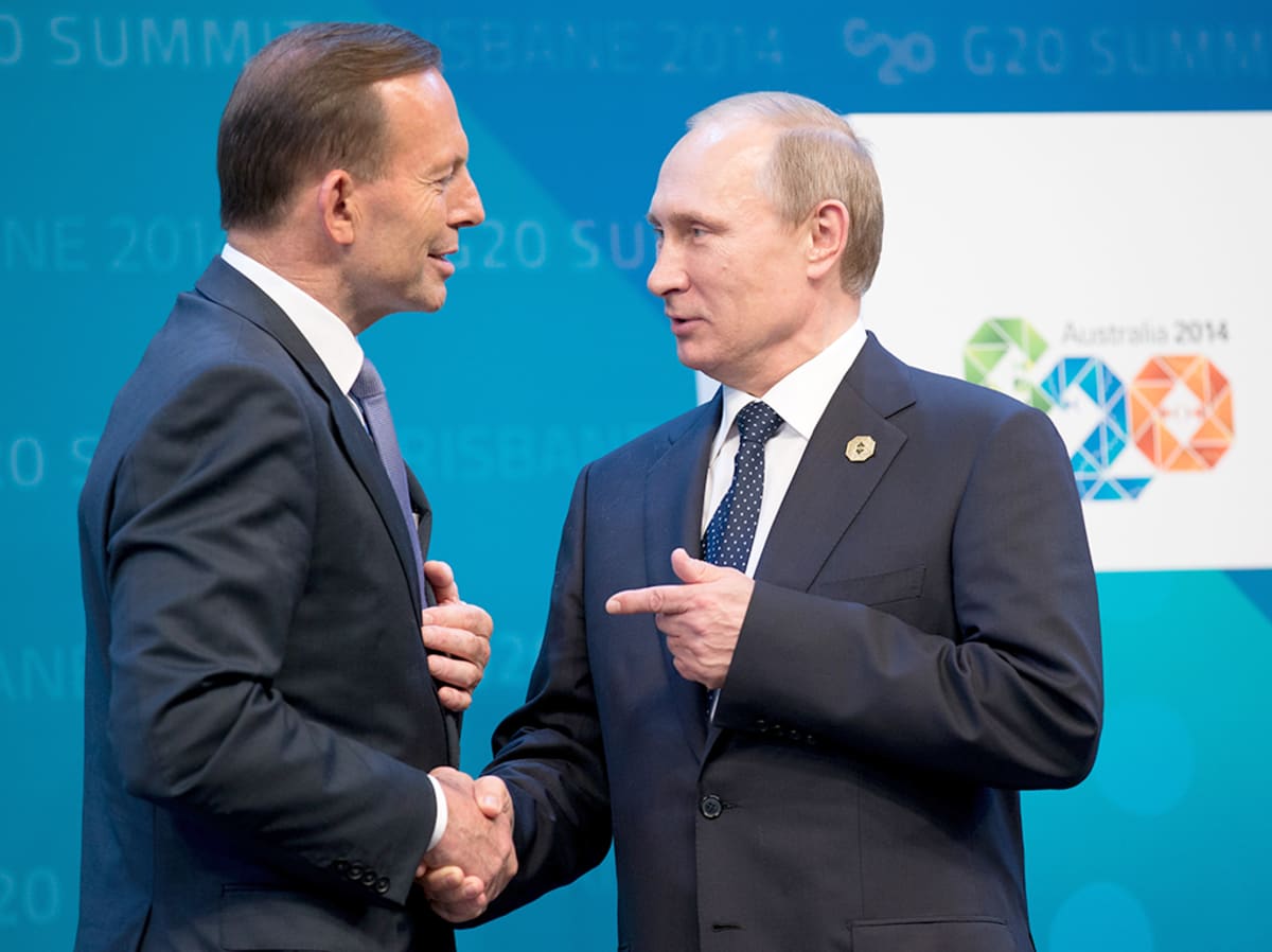 Abbott ja  Putin kättelevät