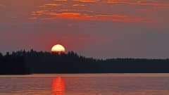 Auringonlasku Kymijoen rannalla.