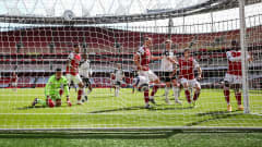 Eddie Nketiah (R) of Arsenal scores the 1-1 equalizer during the English Premier League soccer match between Arsenal FC and Fulham FC in London, Britain, 18 April 2021