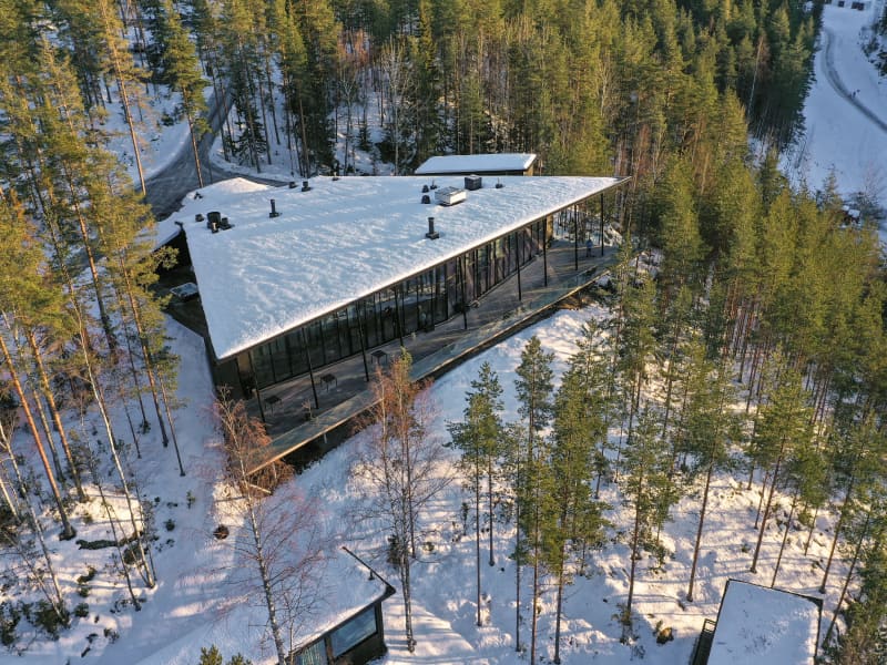 Kuru Resort's restaurant building and forest.